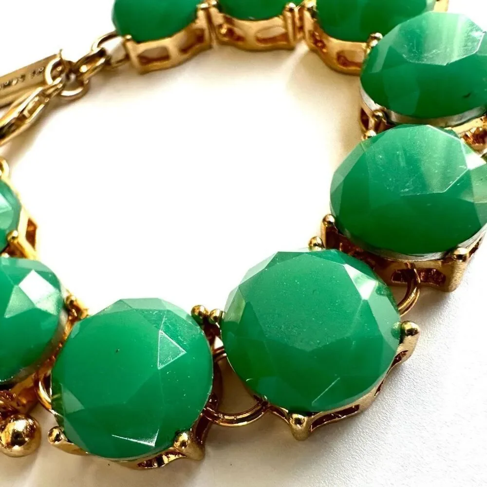 The Limited gold tone and green bracelet